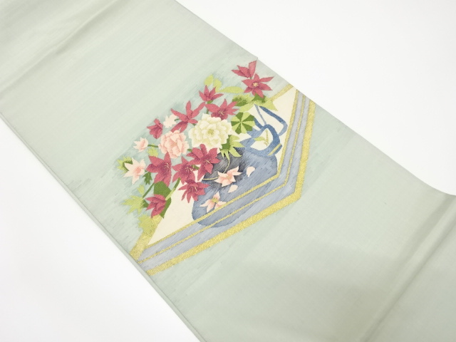 明綴れ花瓶に花模様織出し袋帯